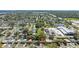 An aerial view of a home located in a neighborhood close to a park, a recreation center, and retail shops at 11114 Freedom Way, Seminole, FL 33772