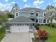 Beautiful two-story home with a large garage, fresh paint, and well-manicured lawn at 11310 Callaway Pond Dr, Riverview, FL 33579