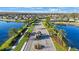 This is an aerial view of the community entrance surrounded by lakes and landscaping at 12523 Longstone Ct, New Port Richey, FL 34655