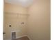 Laundry room with tile floor and hookups at 12523 Longstone Ct, New Port Richey, FL 34655