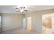 Large main bedroom with ensuite bathroom and walk-in closet at 12523 Longstone Ct, New Port Richey, FL 34655