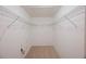 Walk-in closet with carpet and wire shelving at 12523 Longstone Ct, New Port Richey, FL 34655