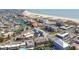 A charming coastal town is shown with nearby beachfront and canal access for many homes and properties at 156 117Th Ave, Treasure Island, FL 33706