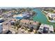 Overhead view of waterfront townhomes with boat docks and access to the Gulf at 156 117Th Ave, Treasure Island, FL 33706