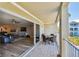 Cozy balcony with outdoor seating, views of the living room and the community at 156 117Th Ave, Treasure Island, FL 33706