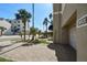 Paver driveway and well-maintained landscaping leading to the home at 156 117Th Ave, Treasure Island, FL 33706