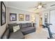 Bright exercise room with ceiling fan, seating and workout equipment at 156 117Th Ave, Treasure Island, FL 33706
