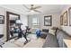 Bright room with exercise bike, couch, large mirror, and natural light at 156 117Th Ave, Treasure Island, FL 33706