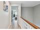 Bright hallway with wood floors leads to bedroom at 156 117Th Ave, Treasure Island, FL 33706