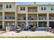 Cozy outdoor patio with comfortable seating offers relaxing space for entertaining at 156 117Th Ave, Treasure Island, FL 33706