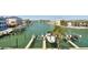 Expansive waterfront view featuring a private boat dock and lift for convenient access to open waters at 156 117Th Ave, Treasure Island, FL 33706