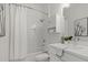Bright bathroom with shower over tub and white vanity at 15909 39Th E Gln, Parrish, FL 34219