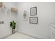 Laundry room with white cabinets, and decorative artwork at 15909 39Th E Gln, Parrish, FL 34219