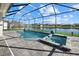 Backyard pool area with brick pavers, screen enclosure and views of the lake at 15909 39Th E Gln, Parrish, FL 34219