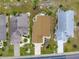 Bird's eye view showing a home with well-maintained landscaping and beautiful curb appeal at 1603 E Del Webb Blvd, Sun City Center, FL 33573