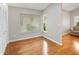 Bright room with wood floors, a window with blinds, and a closet for storage at 1603 E Del Webb Blvd, Sun City Center, FL 33573