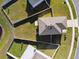 Aerial view of a fenced-in backyard, showcasing its size and privacy at 16614 Mosaic Oar Dr, Wimauma, FL 33598