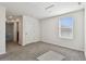 Carpeted bedroom with a window and closet at 16614 Mosaic Oar Dr, Wimauma, FL 33598