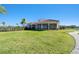 View of the community clubhouse with covered patio at 16614 Mosaic Oar Dr, Wimauma, FL 33598