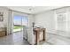 Cozy dining area with tile floors and a view of the backyard at 16614 Mosaic Oar Dr, Wimauma, FL 33598