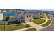 Beautiful two-story home with well-manicured lawn and inviting landscaping at 16614 Mosaic Oar Dr, Wimauma, FL 33598