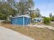 View of the home's exterior and backyard shed from the street at 1700 30Th N Ave, St Petersburg, FL 33713