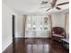 Bright living room featuring hardwood floors, white walls, and window at 1700 30Th N Ave, St Petersburg, FL 33713