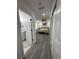 This bedroom has durable floors and is situated near the bathroom at 1913 Park Ave, Tarpon Springs, FL 34689