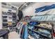 Organized walk-in closet with shelving, hanging rods, and ample storage space at 19445 Redwood Point Dr, Tampa, FL 33647