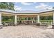 Spacious outdoor pavilion with a fully equipped grill and ample seating for entertaining at 19445 Redwood Point Dr, Tampa, FL 33647