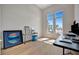 Office area features hardwood floors, large windows with views, and an open floorplan at 20 Bellevue Dr, Treasure Island, FL 33706