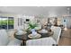 Bright and inviting dining area with modern furnishings open to the updated kitchen and living area at 2008 41St W St, Bradenton, FL 34205