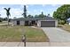 Charming home with a well-manicured lawn, freshly painted exterior, and a two-car garage at 2008 41St W St, Bradenton, FL 34205