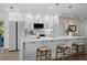 Beautifully updated kitchen with quartz countertops, stainless steel appliances, and counter seating at 2008 41St W St, Bradenton, FL 34205