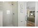 Marble tiled walk-in shower is adjacent to the main bedroom at 2008 41St W St, Bradenton, FL 34205