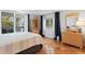 Bright bedroom with natural light, access to a private balcony, and comfortable furnishings at 201 W Laurel St # 212, Tampa, FL 33602