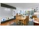 Bright dining area with tile floors, built-in storage and a view into the living room and access to the balcony at 201 W Laurel St # 212, Tampa, FL 33602