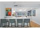 Bright kitchen features an island with seating, modern appliances, and stylish decor at 201 W Laurel St # 212, Tampa, FL 33602