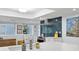 Modern kitchen with stainless steel appliances, ample counter space, and blue subway tile backsplash at 201 W Laurel St # 212, Tampa, FL 33602