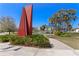 Inviting view featuring pathway, palm trees, and modern landmark at 201 W Laurel St # 212, Tampa, FL 33602