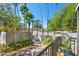 Scenic exterior view with lush landscaping, trees, and a walkway at 201 W Laurel St # 212, Tampa, FL 33602