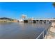 Picturesque waterfront scene showcasing a lift bridge over tranquil waters against a clear sky at 201 W Laurel St # 212, Tampa, FL 33602