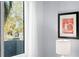 A window view with white curtains, and a framed picture on the white walls nearby at 201 W Laurel St # 212, Tampa, FL 33602
