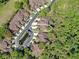A high angle view shows the location of a property in a neighborhood with mature trees and ponds at 2206 Preservation Dr # 2206, Plant City, FL 33566