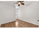 Cozy bedroom with wood floors, ceiling fan, and a bright window at 2206 Preservation Dr # 2206, Plant City, FL 33566