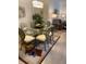Stylish dining room with a glass table, seating for six, and view to living area at 2206 Preservation Dr # 2206, Plant City, FL 33566