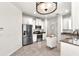 Well-appointed kitchen featuring stainless appliances, and a kitchen island at 2206 Preservation Dr # 2206, Plant City, FL 33566
