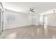 Bright living room with tiled floors, neutral walls, and a ceiling fan at 2206 Preservation Dr # 2206, Plant City, FL 33566