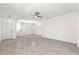 Bright living room featuring tiled flooring, a ceiling fan, and neutral walls at 2206 Preservation Dr # 2206, Plant City, FL 33566