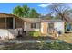 View of a backyard with sheds, utility boxes, and outdoor equipment at 22295 Powell Rd, Brooksville, FL 34602